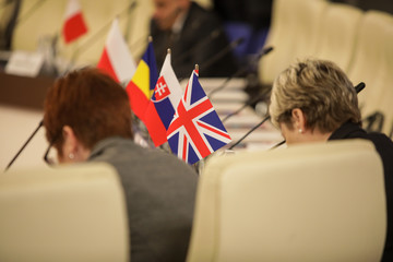 Details with the flag of the United Kingdom during a conference of European Union officials