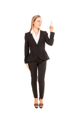 Businesswoman pointing to empty copy space isolated on white background