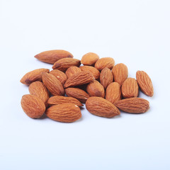 nuts almonds isolated on white background. Selective focus.
