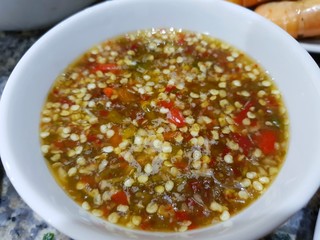 Thai food style, Top view of spicy seafood dipping sauce in white bowl