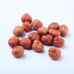 Obraz premium Hazelnuts isolated on white background. Selective focus.