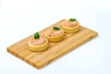 tartlets with filling on a white backgroundtartlets