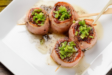 Close up on salmon skewers