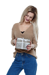 Front view of a woman with a gift box.