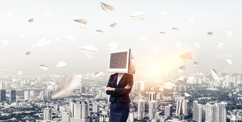 Business woman with monitor instead of head.