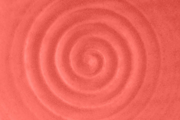 Fototapeta na wymiar Coral color background. Ceramic dish. Circular vibrations