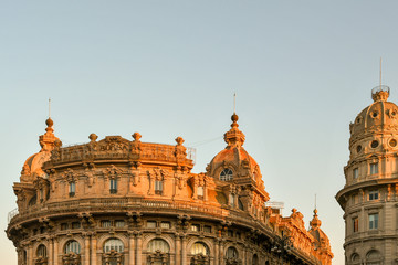 Fototapeta premium Top of the Palazzo della Borsa in Piazza De Ferrari, built in sixteenth-century style between 1906 and 1912 , when Genoa was the first Italian stock exchange, Liguria, Italy