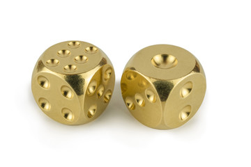 Two golden dices closeup isolated on white background. Six and one side view.