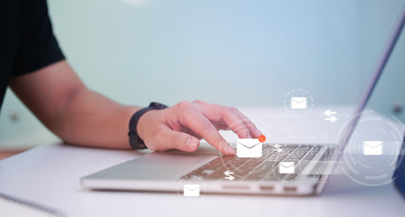 close up businessman checking email online on web with virtual interface technology concept	
