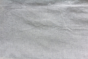 gray coarse cotton background, textured surface