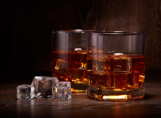 Glasses of whisky with ices
