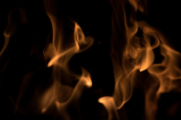 Soft fire flames on black background. Short shutter used. Great for background or overlay design