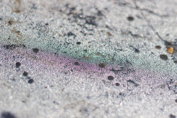 drops of condensate on the surface produce a rainbow