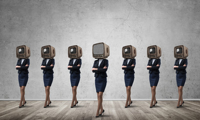 Business women with old TV instead of head.