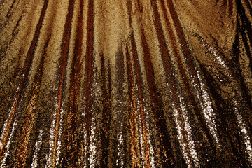 Abstract golden glitter background. Festive background with copy space.