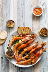 Grilled butterflied prawns