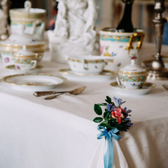 A baroque table setting in the castle. Luxury interior.