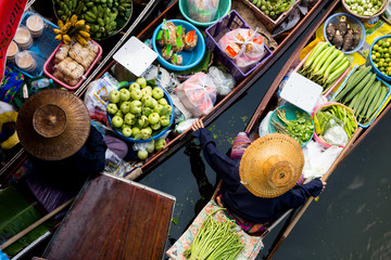 Tha Kha floating market in Thailand. Local farmers selling vegetables.