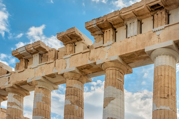 Fototapeta premium Fragment of the Parthenon with statues, an archaic temple located on the Acropolis of Athens, built in 438 BC in Athens, Greece