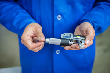 Quality Specialist Hands with measuring devices