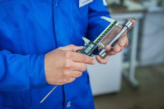 Quality Specialist Hands with measuring devices