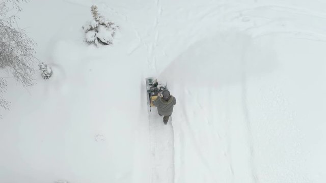 Aerial view of the man on the snow plower