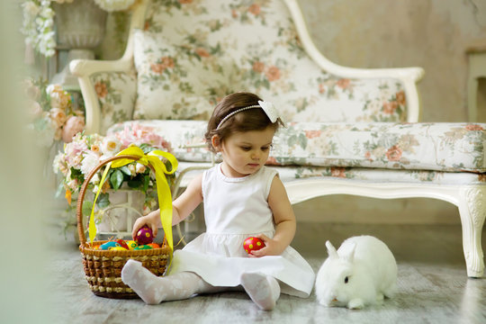 Beautiful girl with a Easter Bunny.