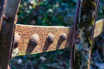 Old rusty waterwheel. Detail shot of rivets