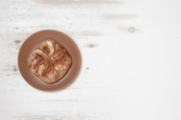 Gluten free homemade apple pie with almonds on white wooden background