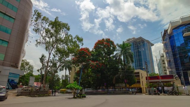 sunny day bangalore city famous downtown traffic street square panorama 4k timelapse india