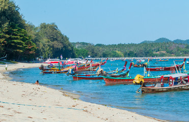 Naklejka na ściany i meble colorful fishing boats on the beach