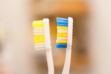 Two toothbrushes, close up