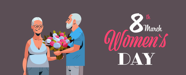 senior man presenting bouquet of flowers to elderly woman international happy womens day 8 march holiday concept couple in love horizontal portrait greeting card