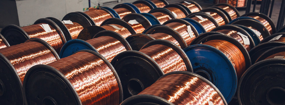 Production of copper wire, bronze cable in reels at factory