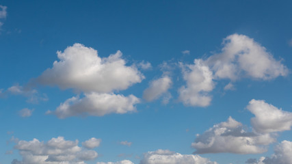 Naklejka na ściany i meble Beautiful Cumulus Clouds and blue sky, Copy Space. Beautiful, sunny Day.