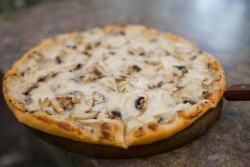 pizza with mushrooms and cheese