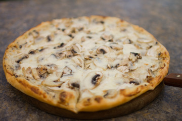 pizza with mushrooms and cheese