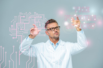 handsome scientist in white coat and glasses moving brain interface with 
