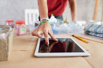 Woman using digital tablet