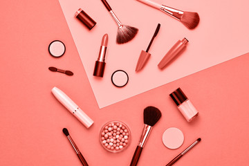 Fashion Cosmetic Makeup Set. Woman Beauty Accessories. Essentials Living Coral colored. Trendy Design Layout. Creative art color. Flat lay. Beauty blogger coral concept.