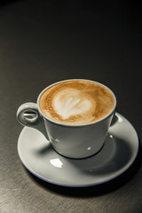 Morning coffee in a white Cup