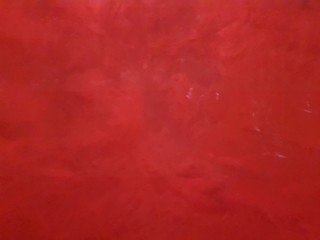 Fototapeta premium Boiling water drops, attractive maroon-red underwater color. Beautiful texture of the movement of the waves