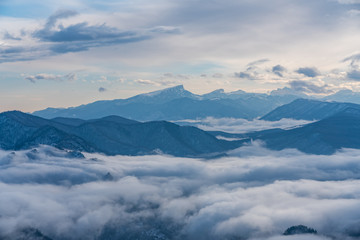 Fototapeta na wymiar Magical Mountain snow panoramic landscape opening from the observation deck Lago-Naki, The Main Caucasian Ridge, Russia