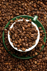 mug with grains of coffee