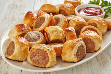 freshly baked Puff pastry Sausage rolls, close-up