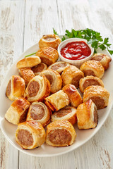 freshly baked Puff pastry Sausage rolls, close-up