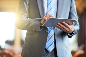 Businessman with digital tablet