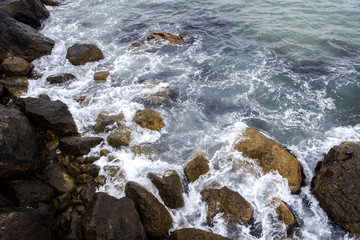 Sea waves, beating on the stones. Noisy sea. Coast of the Black Sea