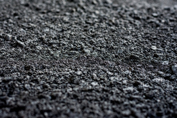 Laying of new asphalt. The new road. Road repair street.