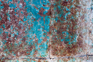 Background from old iron with shabby blue paint and rust